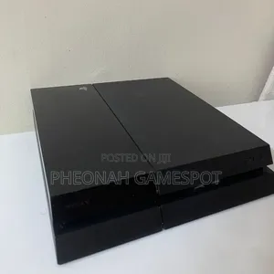 Playstation 4 Standard (PS4 Fat) Chipped Console with 12 Games & 2 Controllers
