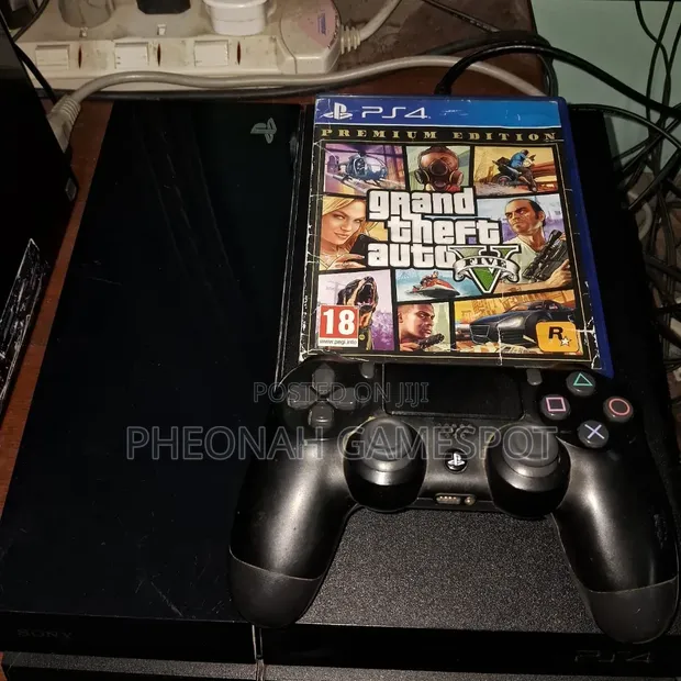 PS4 Standard Console Full Set with 12 Games & 2 Controllers - 1