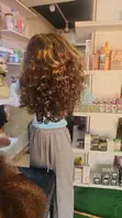 Copper-Toned Curly Hairstyle - 2