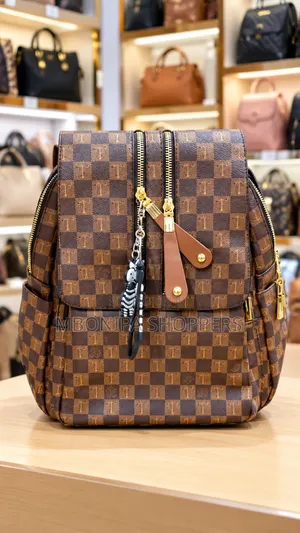 Stylish Brown Checkered Backpack with Gold Zippers