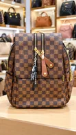 Stylish Brown Checkered Backpack with Gold Zippers - 1