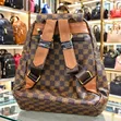 Stylish Brown Checkered Backpack with Gold Zippers - 2