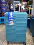 Large Blue Rubber Plastic Suitcase - 1