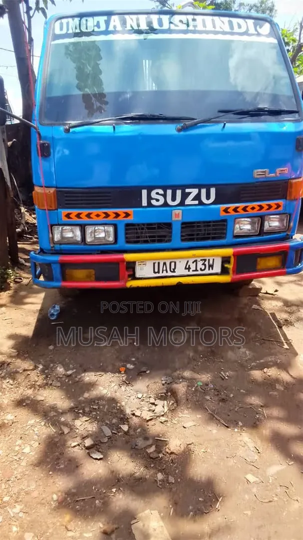 Isuzu Elf Tipper Truck - 1