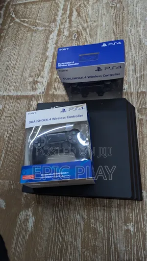 PS4 Pro 1TB with FC 27 & 2 Controllers