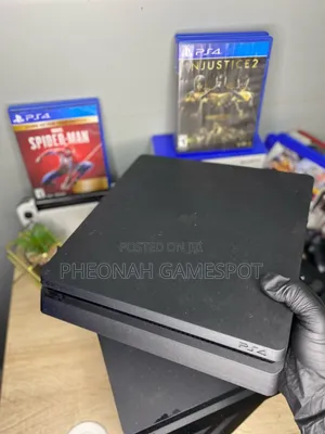 PS4 Slim Console with 13 Games & 2 Controllers