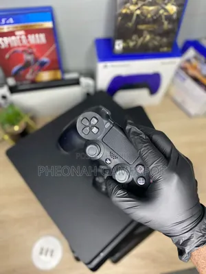 PS4 Slim Console with 2 Controllers and 13 Games