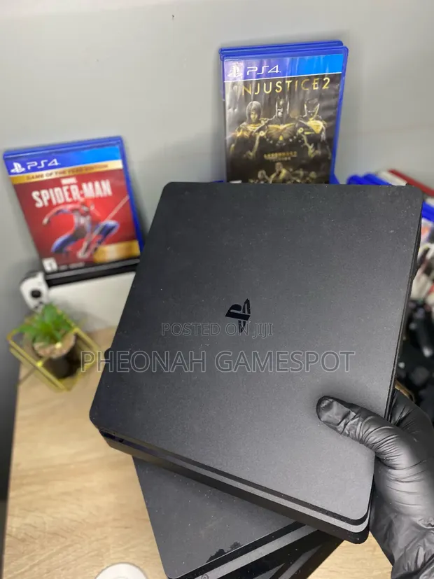 PS4 Slim Console with 12 Games & 2 Controllers - 1