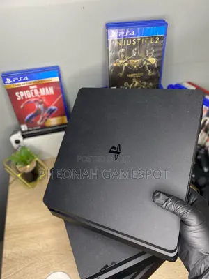 PS4 Slim Console with 12 Games & 2 Controllers