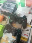 Pair of Used PS3 Controllers - 1