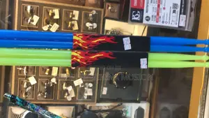 Plastic Drum Sticks - Green and Yellow