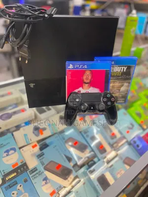 PS4 Standard Console with 13 Games & 2 Controllers