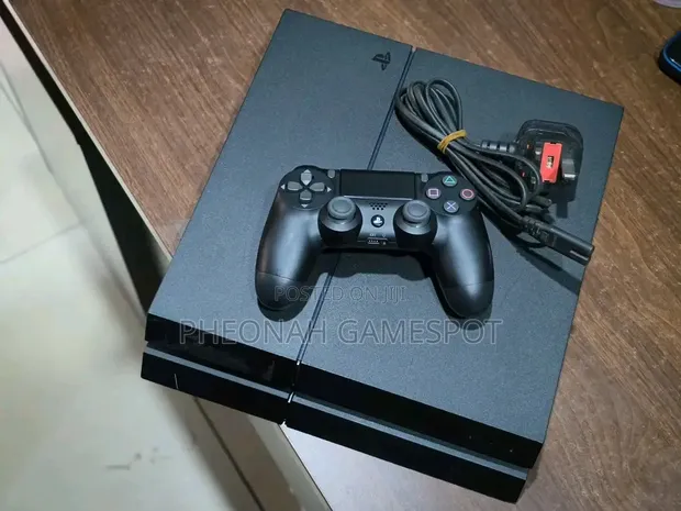 PS4 Standard Console with 13 Games and 2 Controllers - 1