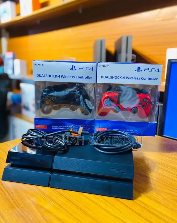 PS4 Standard Console with 13 Games & 2 Controllers - 1