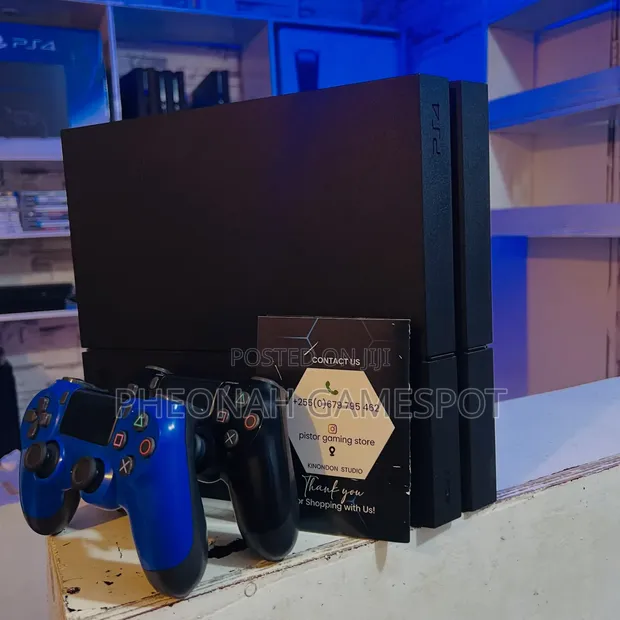 PS4 Standard Console with 13 Games & 2 Controllers - 1