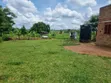 4 Acres Land with 3-Bedroom House in Busia - 1