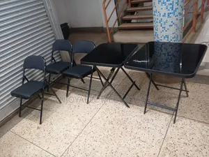4 Chairs and 1 Foldable Glass Dining Table Set