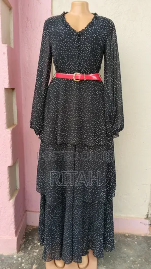 Elegant Black and White Polka Dot Maxi Dress with Long Sleeves
