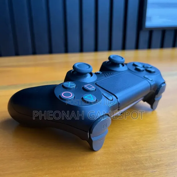 PS4 Original UK Used Controller - 1