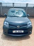 Toyota Sienta 2011 Gray - 1