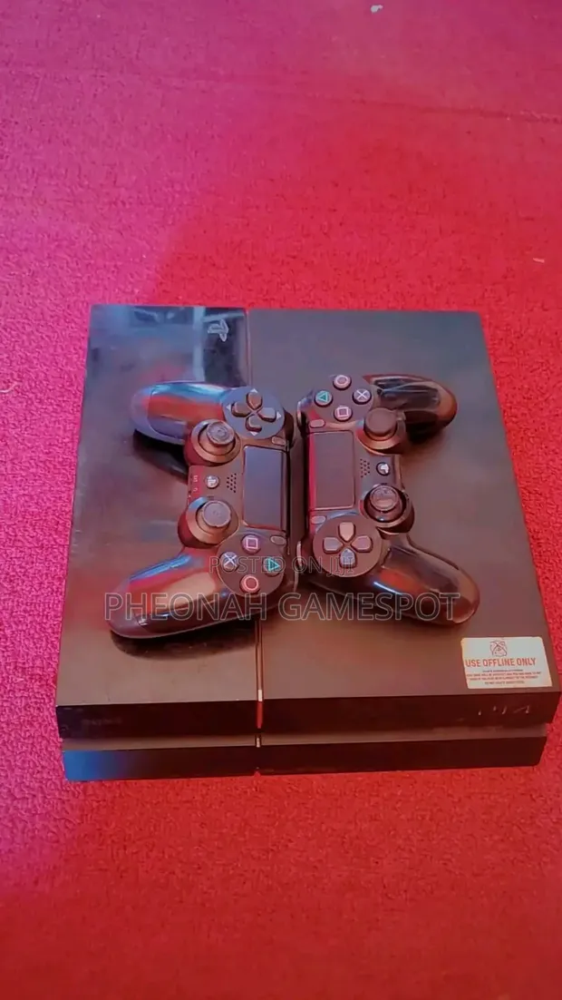 PS4 Standard Console with 12 Games & 2 Controllers - 1