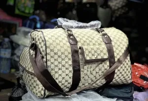 Beige and Brown Patterned Travel Duffel Bag