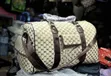 Beige and Brown Patterned Travel Duffel Bag - 1