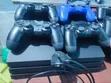 Playstation 4 Pro with 4 Controllers and 15 Games - 2