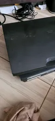 PS3 Slim Console with 2 Controllers & 20 Games - 1