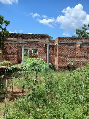 0.56 Acre Titled Land with Unfinished 4-Bedroom House in Zirobwe