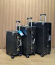 Black Hardshell Ribbed Aluminum-Frame Travel Suitcases - 1