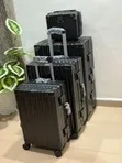 Black Hardshell Ribbed Aluminum-Frame Travel Suitcases - 2