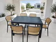 Black Dining Table and 6 Beige Plastic Chairs - 2