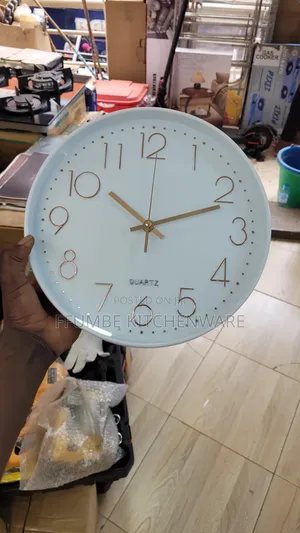 Pink Wall Clock with Rose-Gold Numbers
