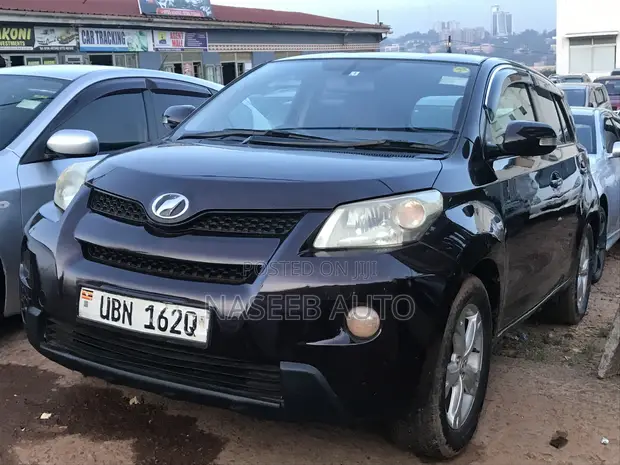 Toyota IST 2009 Maroon - 1