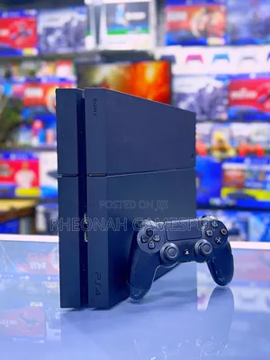 PS4 Standard Console with 12 Games & Two Controllers