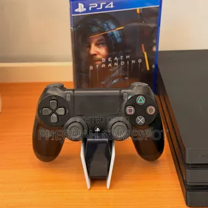 PS4 Pro with 32 Games and 2 Controllers