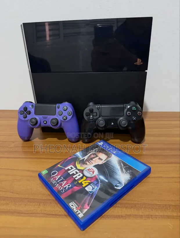 Chipped Sony PlayStation 4 with 2 Controllers and 12 Games - 1