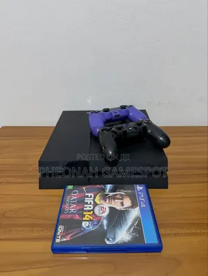 Chipped PS4 with 12 Games & 2 Controllers