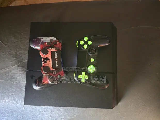 PlayStation 4 (PS4) 1TB Chipped with Games & Two Controllers - 1