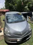 Toyota Ractis 2010 Gray - 2